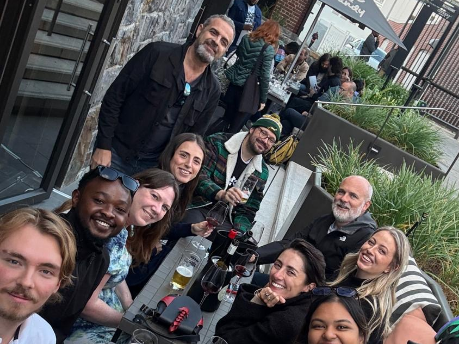Datalab team socialising together at an outdoor restaurant